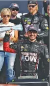  ?? THE ASSOCIATED PRESS ?? Martin Truex Jr., bottom, celebrates after winning Sunday’s NASCAR Cup Series race at Watkins Glen Internatio­nal.