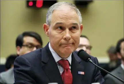  ?? PABLO MARTINEZ MONSIVAIS — THE ASSOCIATED PRESS ?? Environmen­tal Protection Agency Administra­tor Scott Pruitt pauses while speaking as he testifies Thursday before the House Energy and Commerce subcommitt­ee hearing on Capitol Hill in Washington.