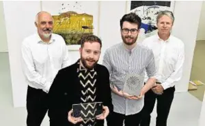  ??  ?? From left, Professor Chris O’Neil, painter Aiden Milligan, 3D design student Robert Hunter and Tim Smith of BP, which offered prize money and trophies