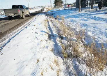  ?? DAVID BLOOM / POSTMEDIA NEWS ?? The scene of this week’s two-vehicle crash in Nisku, Alta.