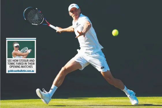  ?? Picture: GETTY IMAGES ?? John Millman returns against Stefano Travaglia, of Italy, in their first-round match at Wimbledon.