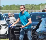  ?? Greg Lovett / Associated Press ?? New York Mets pitcher Max Scherzer arrives for contract negotiatio­ns at Roger Dean Stadium in Jupiter, Fla., on Feb. 23. The Mets, unlike some other teams, will have no problem paying the penalties for going over the new luxury tax threshold.