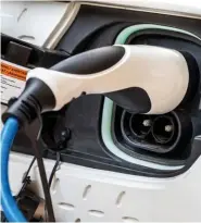  ??  ?? Above: The Kona’s charging socket is in its nose. Below: The Kona Electric has very distinct looking lighting elements