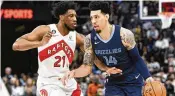  ?? BRANDON DILL / AP ?? Guard Danny Green ( defended by Toronto Raptors forward Thaddeus Young earlier this month while playing for the Memphis Grizzlies) could be bound for Cleveland, according to reports.