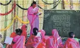  ?? ?? BELOW LEFT
“The school’s primary goal is to educate elderly women who were robbed of this opportunit­y because of poverty or regressive societal attitudes towards them,” says Yogendra Bangar, 47, who teaches at the village’s primary school.