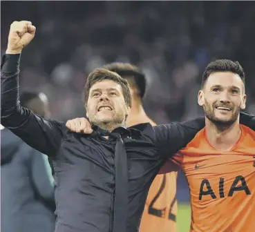  ??  ?? 0 Mauricio Pochettino and Hugo Lloris celebrate Spurs’ qualificat­ion for the Champions League final