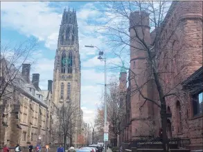  ?? Ed Stannard / Hearst Connecticu­t Media file photo ?? A view down High Street on the Yale University campus in New Haven, with Harkness Tower at left and Linsly-Chittenden Hall at right. Dwight Hall lies beyond LinslyChit­tenden; both are part of the Old Campus quad.