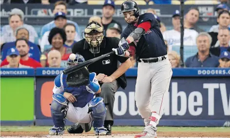  ?? MARK J. TERRILL/THE ASSOCIATED PRESS ?? Boston Red Sox first baseman Steve Pearce hit a two-run homer against Los Angeles Dodgers starter Clayton Kershaw in the first inning of Game 5 of the World Series Sunday in Los Angeles. The Red Sox entered the day needing one win to claim the title.