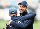  ?? ?? Mark Woods is all smiles in a nets session with England