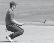  ?? Tom Pennington / Getty Images ?? Jordan Spieth missed this putt, but few others en route to a 64, which was one stroke off the lead.