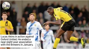  ?? ?? Lucas Akins in action against Oxford United. He ended a near eight-year associatio­n with the Brewers in January.