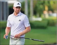  ?? Mike Ehrmann / Getty Images ?? Daniel Berger reacts on the 17th green during the second round of The Honda Classic on Friday.