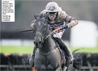  ??  ?? Joshua Moore rides Deebaj clear at the last before going on to win the PDC Handicap Hurdle at Lingfield