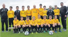  ??  ?? John Hume, sponsor (back row, centre), Fresh-Jet Ltd presents Maryfield U/14s with new kit.