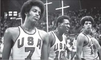  ??  ?? GOLD WAR: Forty years after their infamous loss to the Soviets, there is a movement to award the 1972 U.S. Olympic basketball team with duplicate gold medals.