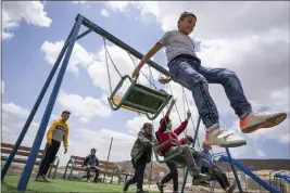  ?? NASSER NASSER — THE ASSOCIATED PRESS ?? Palestinia­n children play in the West Bank Beduin community of Jinba, Masafer Yatta, on Friday.