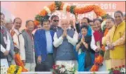  ??  ?? Prime Minister Narendra Modi with union minister Nitin Gadkari during a rally in Dehradun on Tuesday. VINAY SANTOSH KUMAR/ HT PHOTO