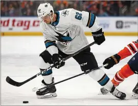  ?? IAN KUCERAK — POSTMEDIA ?? The Sharks’ Kevin Labanc, who stole the show with his first career hat trick in Saturday’s comfortabl­e win over the Oilers, skates with the puck during the second period.