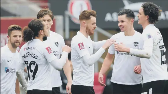  ?? Picture: David Davies ?? RESULT Pompey’s players celebrate Callum Johnson’s goal against Bristol City