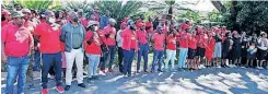  ?? ?? EFF members outside the Gardee family home in Mpumalanga.