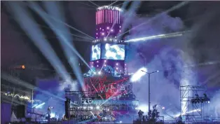  ?? AP PHOTO ?? Projectors light the sky during the “We are Colours” opening show at 30-metre-high 360-degree-visibility tower, designed at six levels specially for the opening of Plovdiv European Capital of Culture 2019, Bulgaria, Saturday.