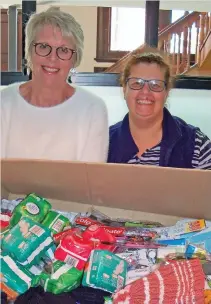  ??  ?? Shirley Coetzee and Susan Graaff display the items received.