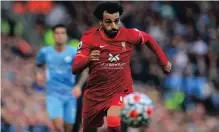  ?? ?? LIVERPOOL’S Mohamed Salah is in great form going into their Premiershi­p contest against Manchester United tomorrow. | PAUL ELLIS AFP