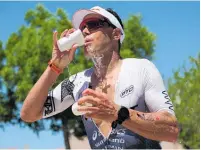  ?? Photo / Getty Images ?? Braden Currie finishes third in Ironman World Championsh­ip in St. George, Utah.