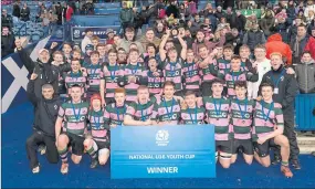  ??  ?? JOB DONE: The victorious Ayr U16s start their Murrayfiel­d party yesterday