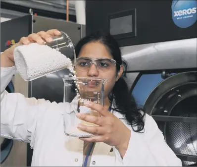  ??  ?? Senior research scientist Mehrin Chowdhury at Xeros tests its polymer bead technology.