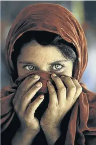  ??  ?? Sharbat Gula, the Afghan girl, at Nasir Bagh refugee camp near Peshawar, Pakistan, 1984.