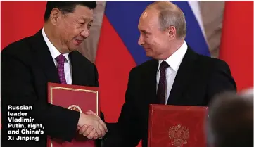  ??  ?? Russian leader Vladimir Putin, right, and China’s Xi Jinping