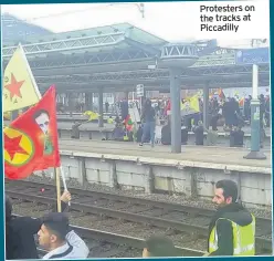  ??  ?? Protesters on the tracks at Piccadilly