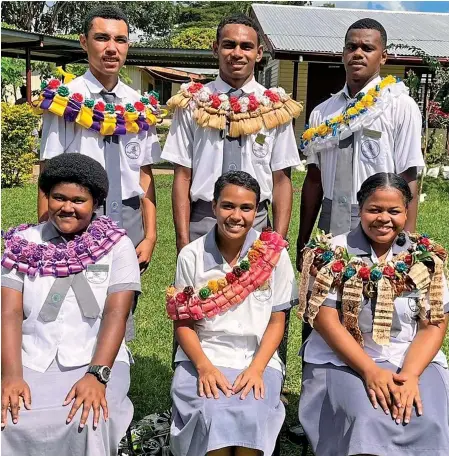  ?? ?? Standing L-R Assistant head boy Isaac Macpheson, head boy Veretaki Tuilekutu, assistant head boy Josevata Tora, seated - assistant head girl Losana Daunitutu, head girl Kalolani Niubalavu and assistant head girl Stefany Soronamata.