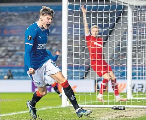  ??  ?? IMPRESSIVE: Nathan Patterson celebrates after scoring to make it 2-1 against Royal Antwerp at Ibrox last month.