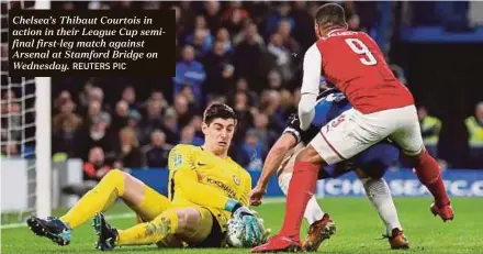  ?? REUTERS PIC ?? Chelsea’s Thibaut Courtois in action in their League Cup semifinal first-leg match against Arsenal at Stamford Bridge on Wednesday.