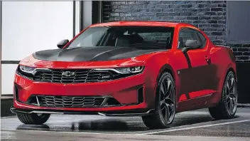  ?? CHEVROLET ?? Chevrolet has given the 2019 Camaro bolder front- and rear-end styling. The RS appearance package adds a polished black grille with chrome inserts, new headlamps with an LED signature light bar.