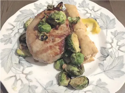  ?? PHOTOS: PETER HUM ?? Maple-glazed pork loin with brussels sprouts and savoury pastry stuffed with white bean at Jack Ketch in Stittsvill­e.