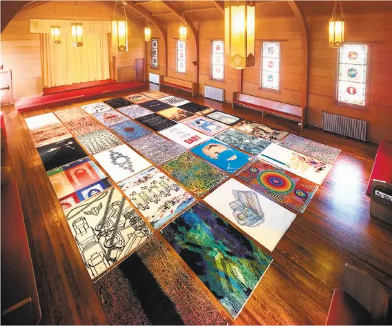  ?? Robert Divers Herrick / For-Site Foundation ?? “Sanctuary” at the Fort Mason Chapel consists of 36 rugs by artists from 21 countries whose designs were executed by master rug makers in Pakistan.