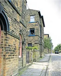  ?? ?? The cobbled streets of Saltaire have been used in many TV production­s, from Gentleman Jack to The Railway Children Return.