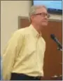  ?? EVAN BRANDT — DIGITAL FIRST MEDIA ?? Railroad consultant Thomas Frawley addresses Phoenixvil­le Borough Council during Tuesday’s meeting. Behind him, is local developer Manny DeMutis, who paid for the study on returning passenger rail to Phoenixvil­le.