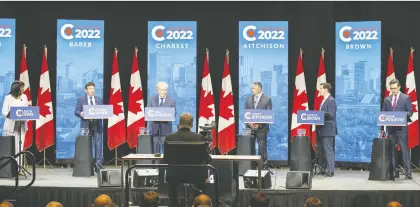  ?? GREG SOUTHAM ?? Conservati­ve leadership candidates, from left, Leslyn Lewis, Roman Baber, Jean Charest, Scott Aitchison, Patrick Brown and Pierre Poilievre take part in the party's English debate in Edmonton Wednesday.