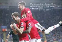  ?? — Reuters ?? Manchester United’s Juan Mata celebrates scoring their second goal.