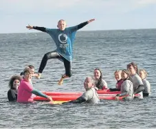  ?? ?? Josh Hemingway, from Filey, jumps for joy at the event.