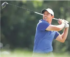  ??  ?? McIlroy plays his shot from the 18th tee during the final round of the Travelers Championsh­ip at TPC River Highlands on June 25, 2017 in Cromwell, Connecticu­t. — AFP photo