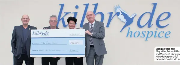  ??  ?? Cheque this out May Miller, Robert Miller and Marc Swift alongside Kilbryde Hospice chief executive Gordon McHugh