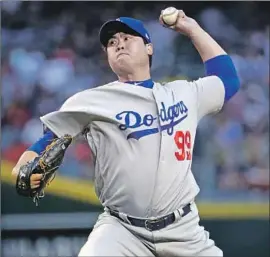  ?? Matt York Associated Press ?? HYUN-JIN RYU has been one of the Dodgers’ best starters this season, but he left Wednesday’s game in the second inning and his status is up in the air.