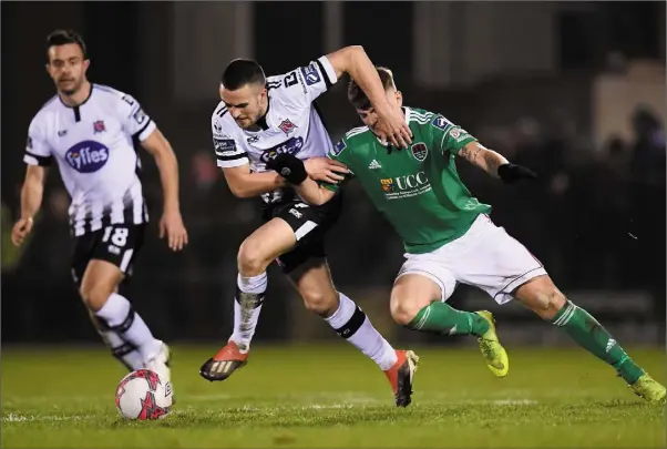  ??  ?? Michael Duffy of Dundalk in action against James Tilley of Cork City during President’s Cup Final.