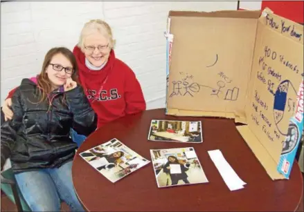  ?? MIKE JAQUAYS — SPECIAL TO THE DISPATCH ?? Edward R. Andrews Elementary School sixth-grader Robin Colvin, left, and Principal Deb Dushko chat about Colvin’s recent school-wide dreamcatch­ers project in Dushko’s office in Morrisvill­e on Feb. 6.