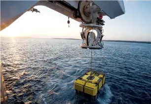  ?? AFP ?? A submersibl­e vehicle being lowered to the wreckage of Australia’s first submarine HMAS AE1 from aboard Microsoft co-founder Paul Allen’s research vessel Petrel. —